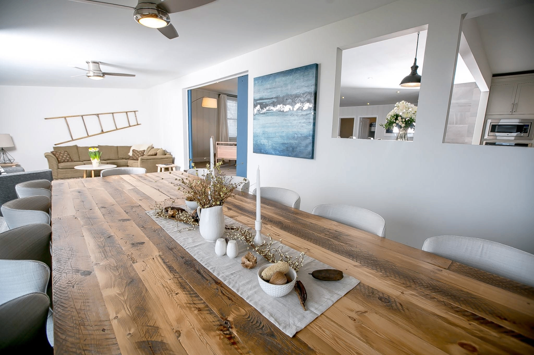 Detailed styling view of a custom rustic dining table and decor